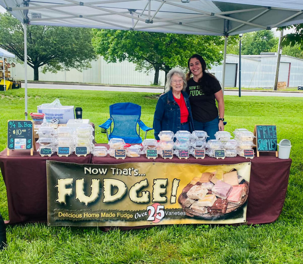 Miriah and her grandmother at a Now That's Fudge event booth